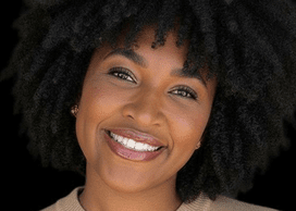 Alisa-Carmichael-Headshot-2026 1.png